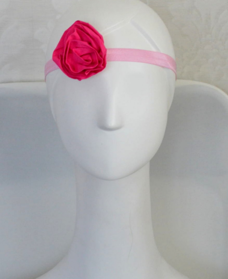 Stilinga rožinės spalvos galvajuostė