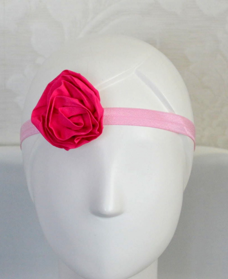 Stilinga rožinės spalvos galvajuostė